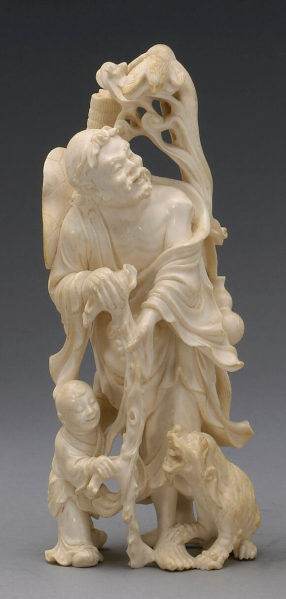 Bonhams : A carved ivory figure group of an immortal and attendant 19th ...