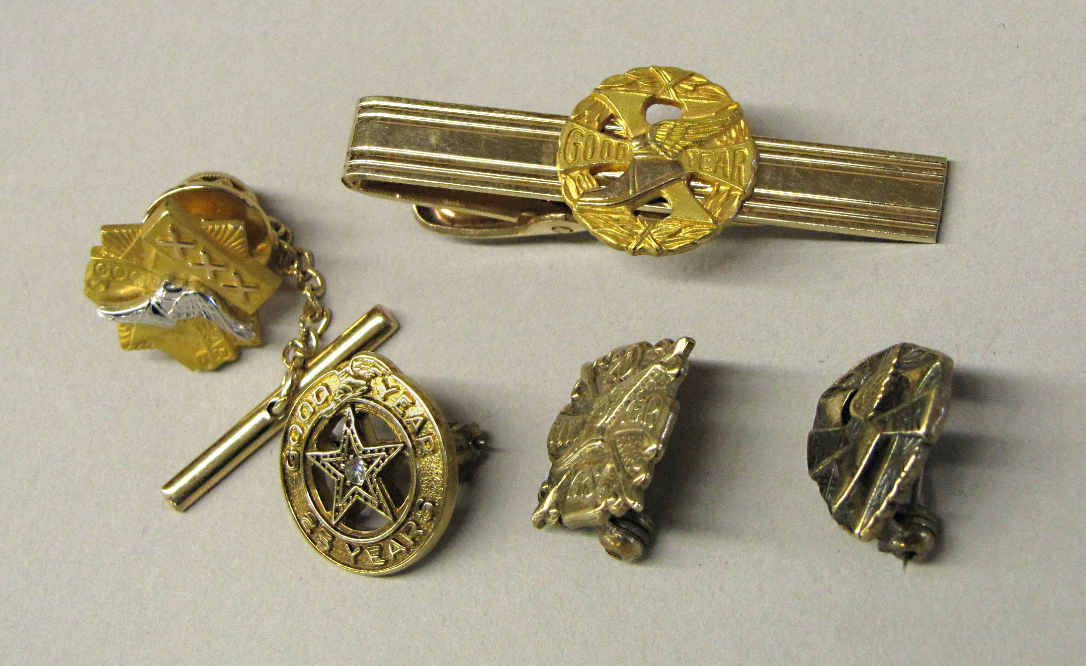 A set of five Goodyear long service badges,