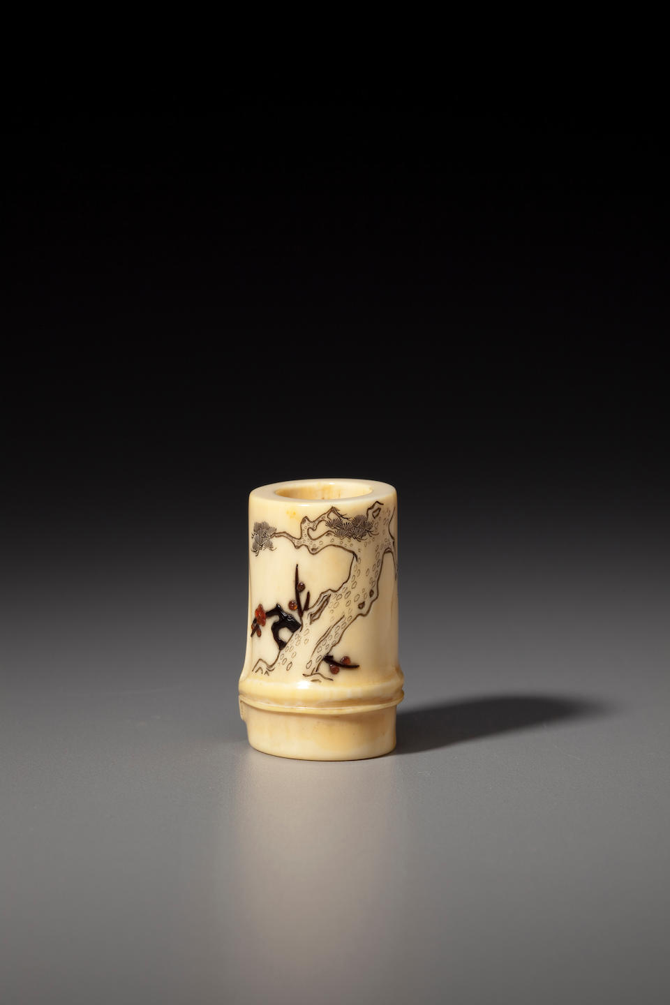 Bonhams : Inlaid-ivory netsuke of 