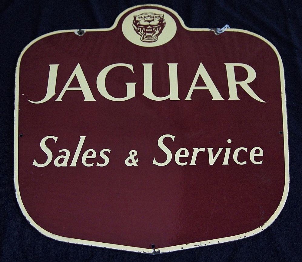 Bonhams Cars : An enamel Jaguar 'Sales & Service' sign, 17½ by 20in.