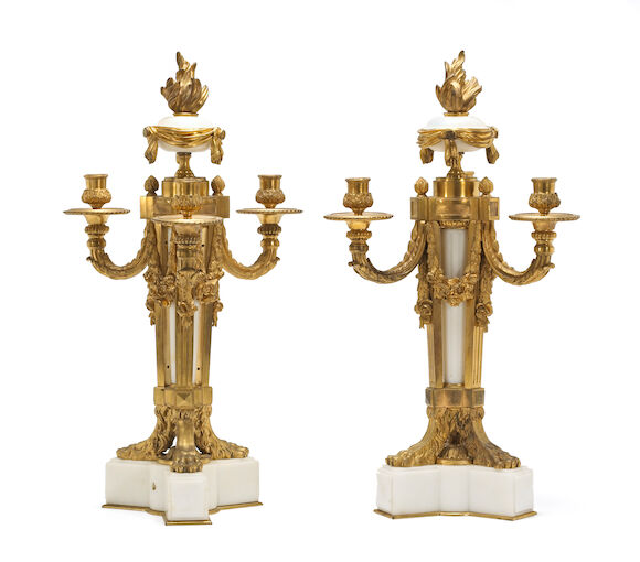 Bonhams : A pair of Louis XVI style gilt bronze and marble three light ...
