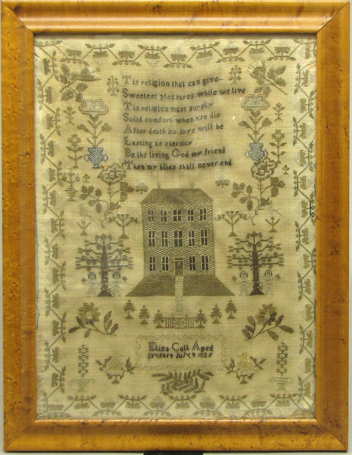 A framed needlework verse sampler Eliza Cull dated July 4, 1825