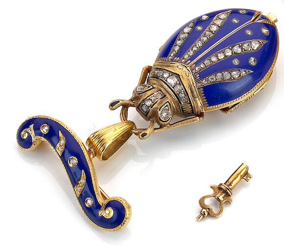 Bonhams : Swiss. A blue enameled gold gem set scarab watch and a ...