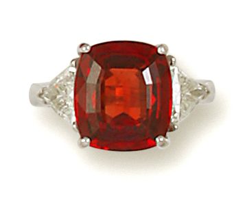 A garnet and diamond ring