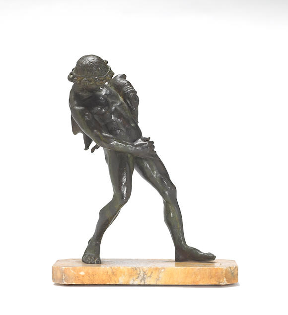 Bonhams : A patinated bronze figure of a faun with wine sack after the ...