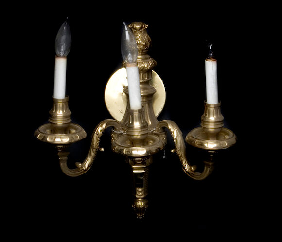 Bonhams : A set of four Regence style gilt metal three light bras de ...