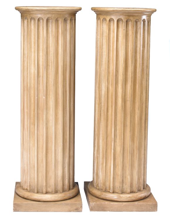 Bonhams Three Michael Taylor carved wood fluted columnar pedestals
