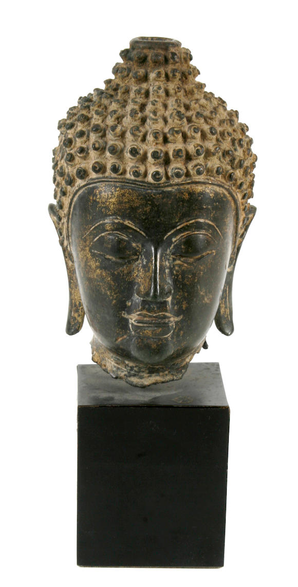 Bonhams : A bronze head of Buddha on stand, Bodhisattva