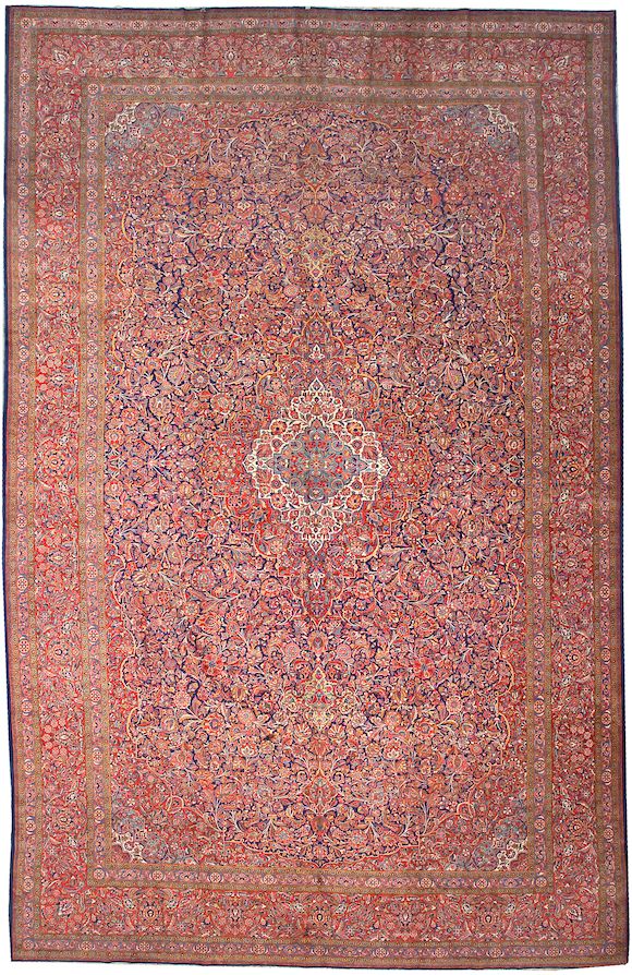 Bonhams A Kashan carpet size approximately 11ft. 10in. x 18ft. 6in.