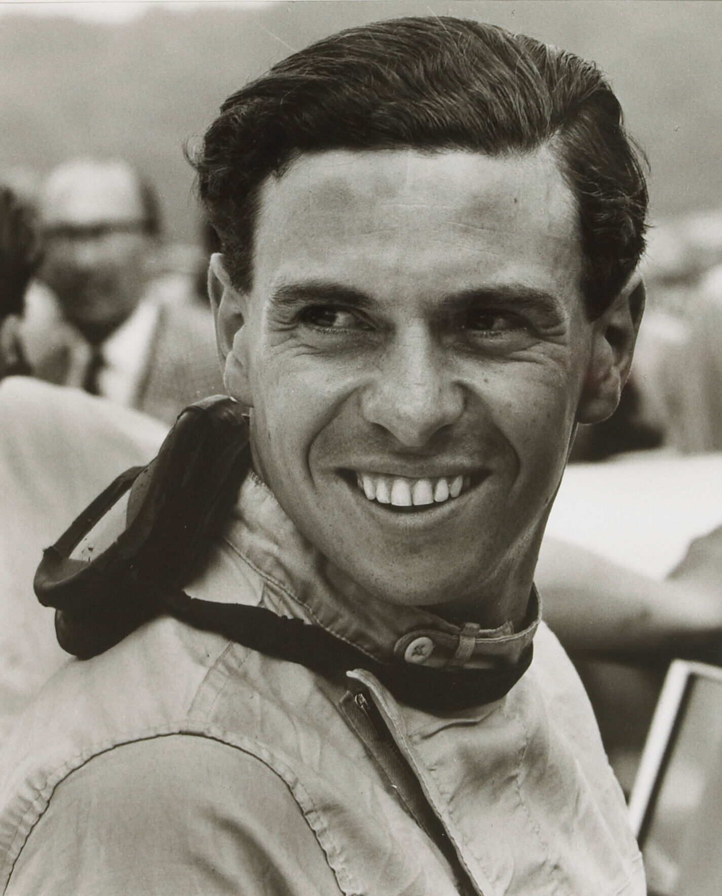 Bonhams Cars : A monochrome photograph of Jim Clark at Indianapolis,