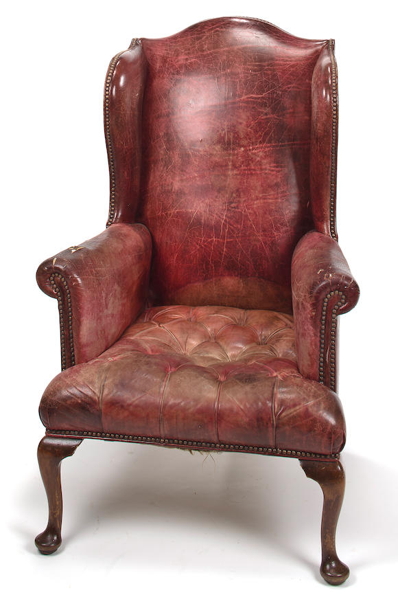 Bonhams : A George III style leather-upholstered mahogany wing armchair