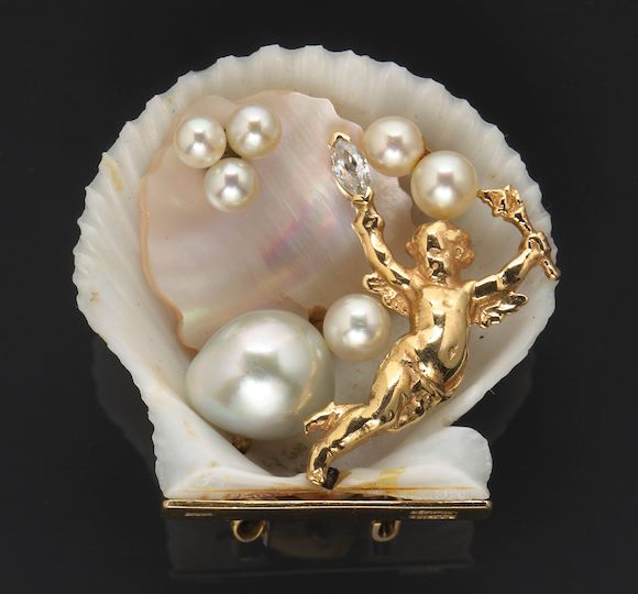 Bonhams A shell, cultured pearl, diamond and mother of pearl clip brooch, Seaman Schepps