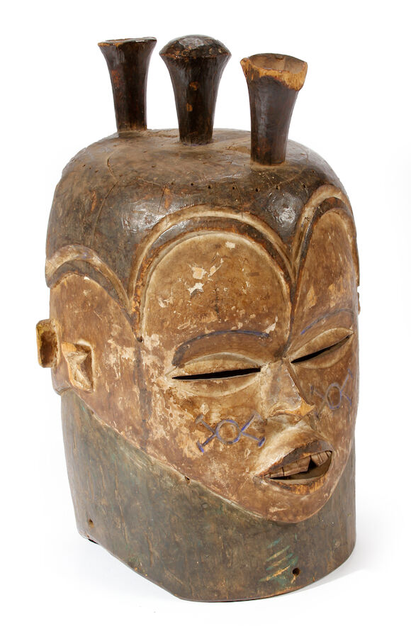 Bonhams : An Ibo Janiform helmet mask with curved hairline cylindrical ...