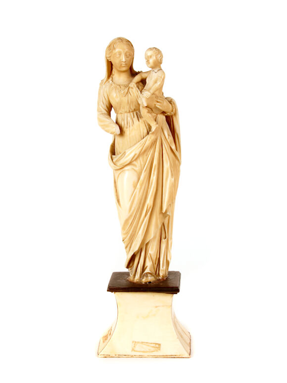 Bonhams : A Continental ivory figural group of the Madonna and Child