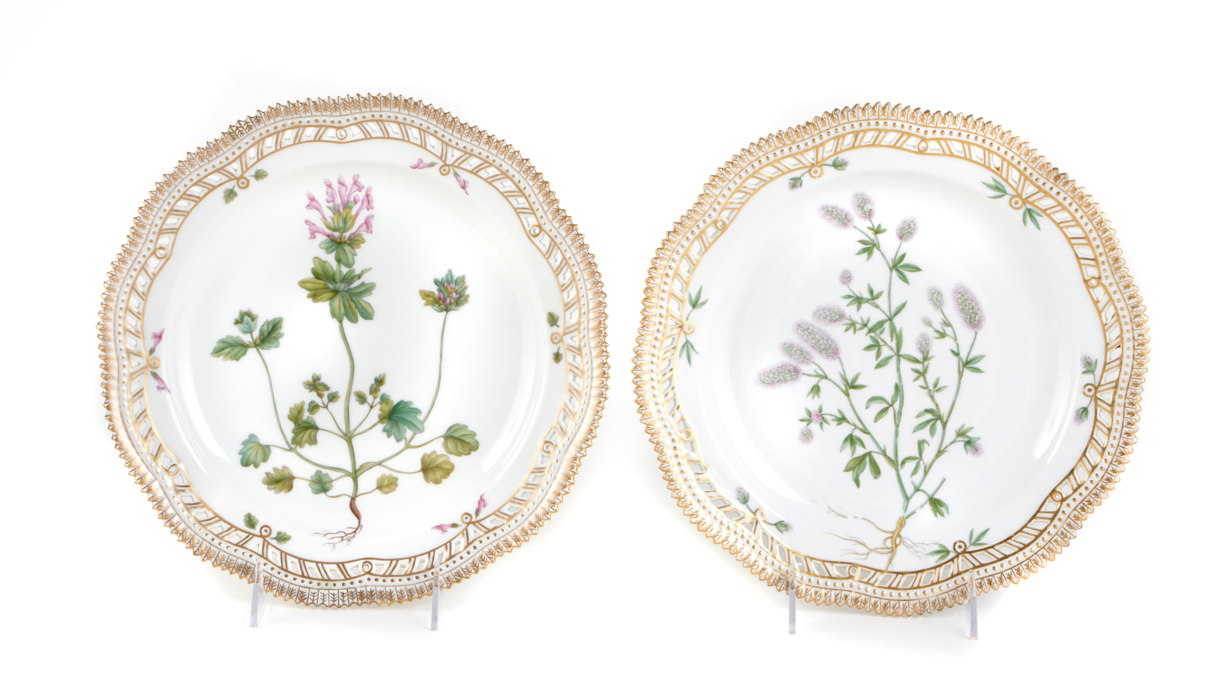A set of twenty-nine Royal Copenhagen Flora Danica dinner plates
