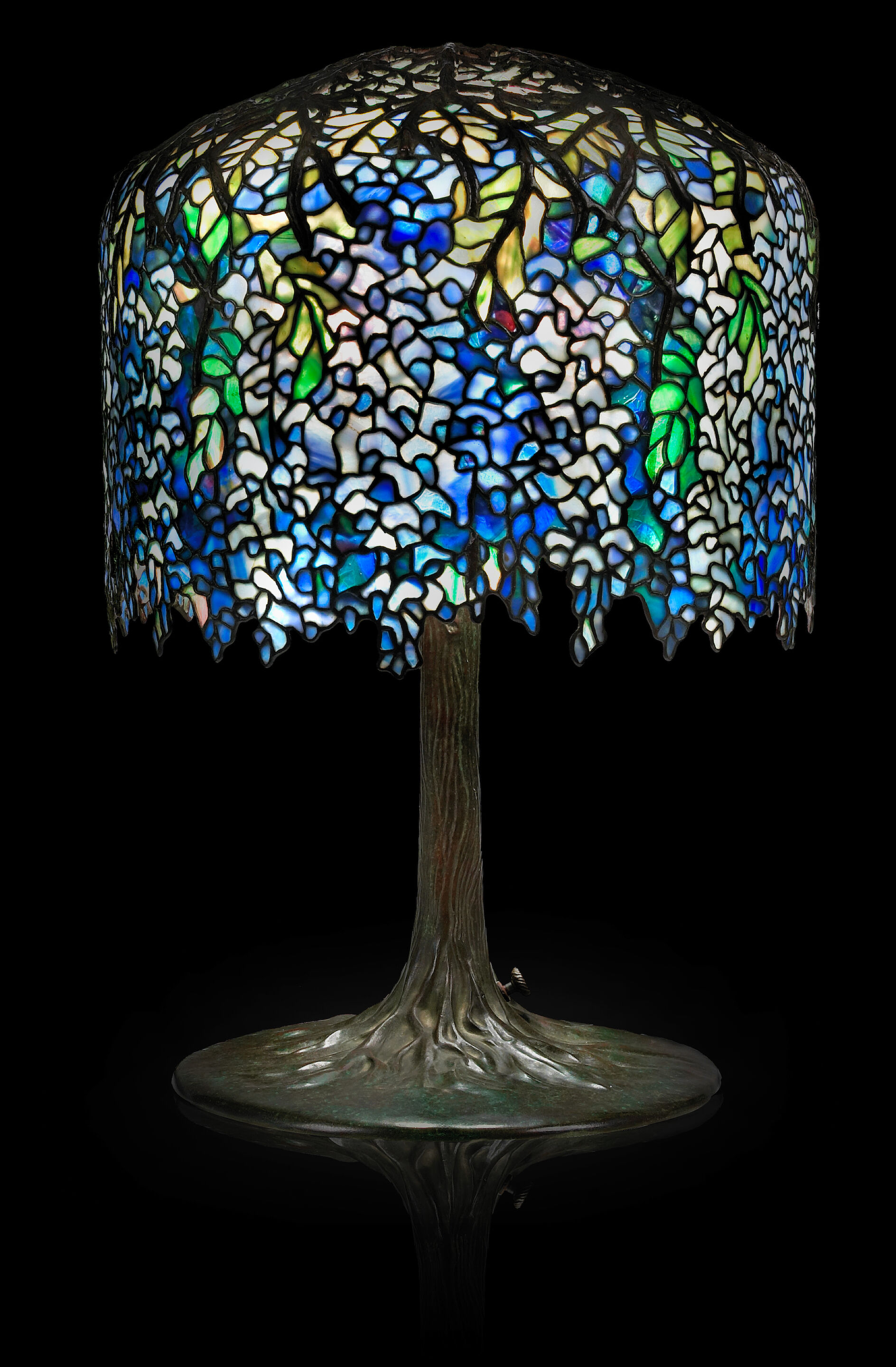 A fine Tiffany Studios Favrile glass and bronze Wisteria table l