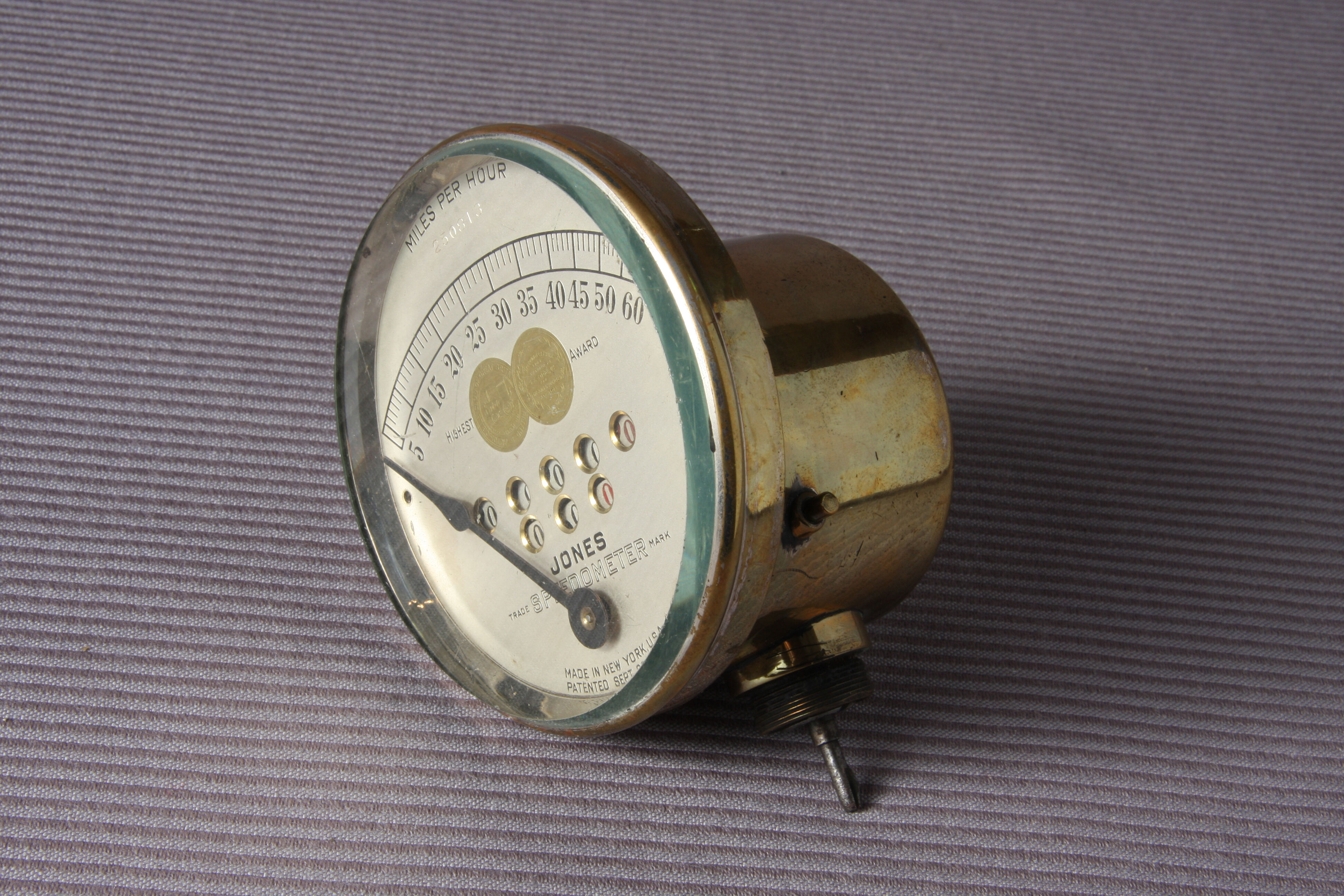 Bonhams Cars : A medium sized 60mph Jones speedometer,