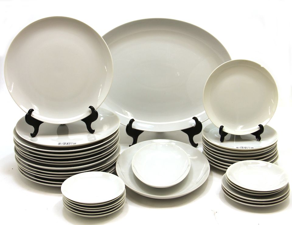 Bonhams An assembled black and white porcelain dinner service