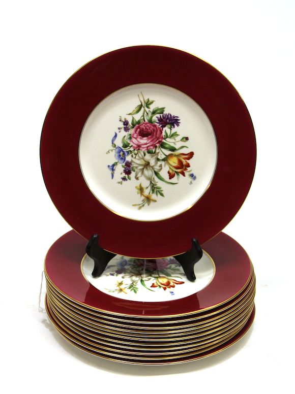 Bonhams Twelve Royal Worcester bone china plates in the Miranda pattern