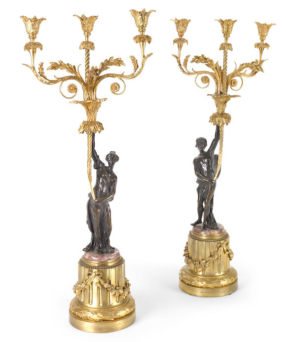 Bonhams : A pair of Louis XVI style gilt and patinated bronze three ...