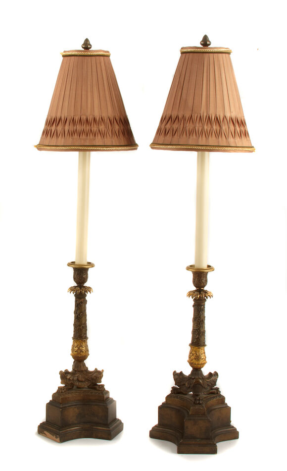 Bonhams : A pair of Empire style parcel gilt and patinated bronze ...