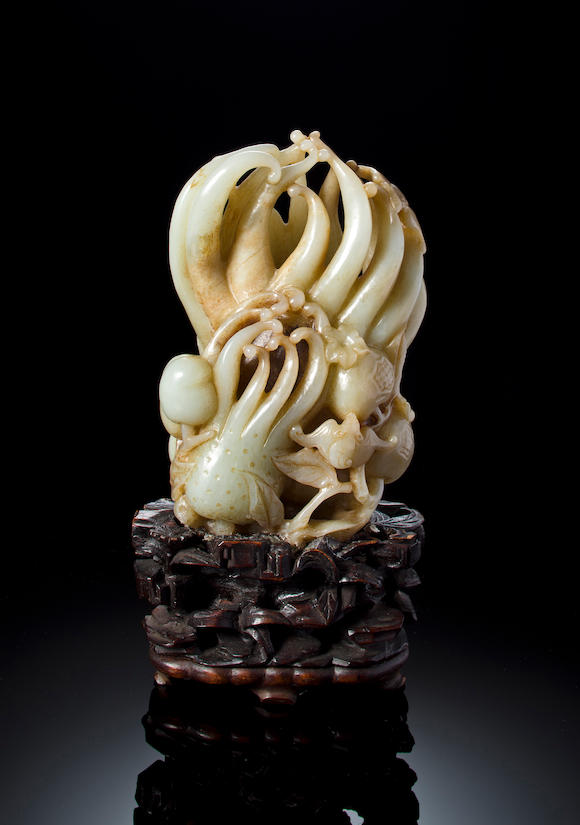 Bonhams : A carved jade finger citron with pomegranates and peaches