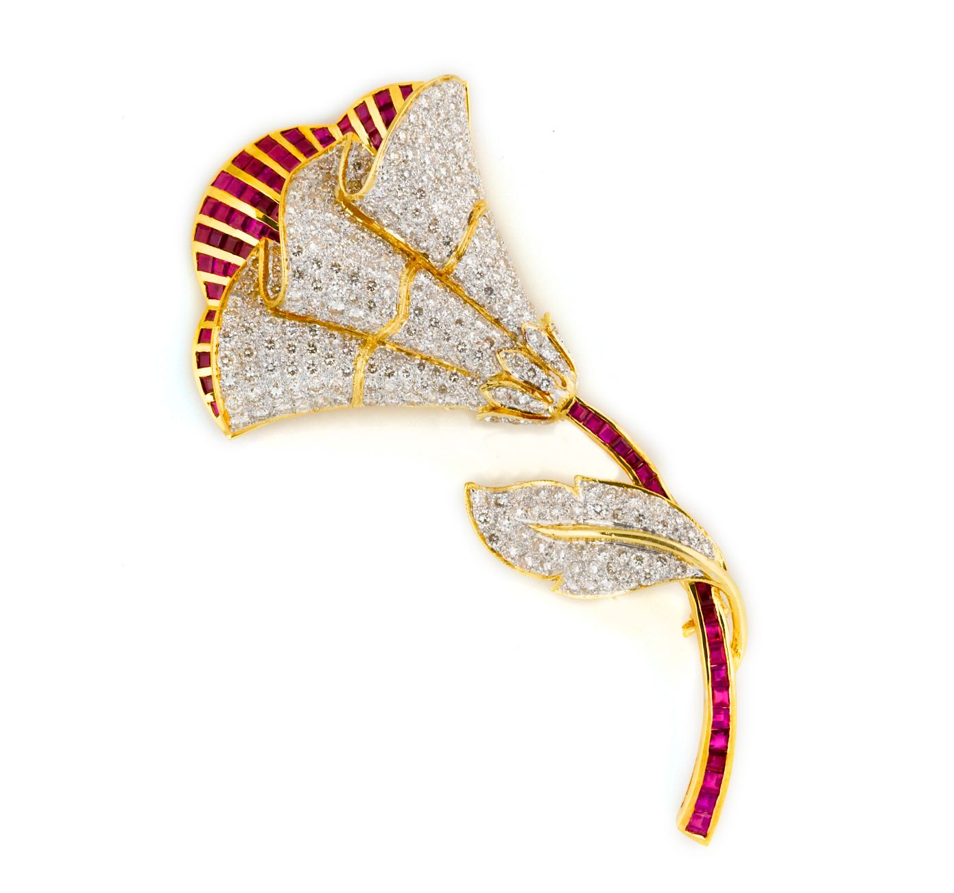 A diamond and ruby flower brooch