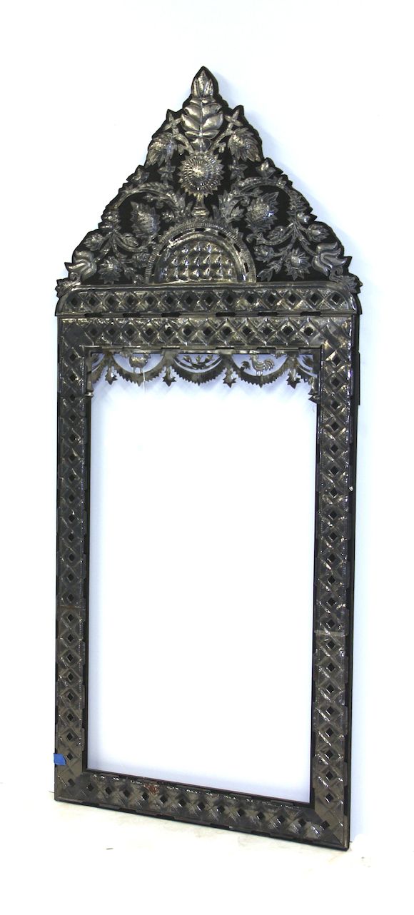 Bonhams A pair of Mexican punched tin mirror frames