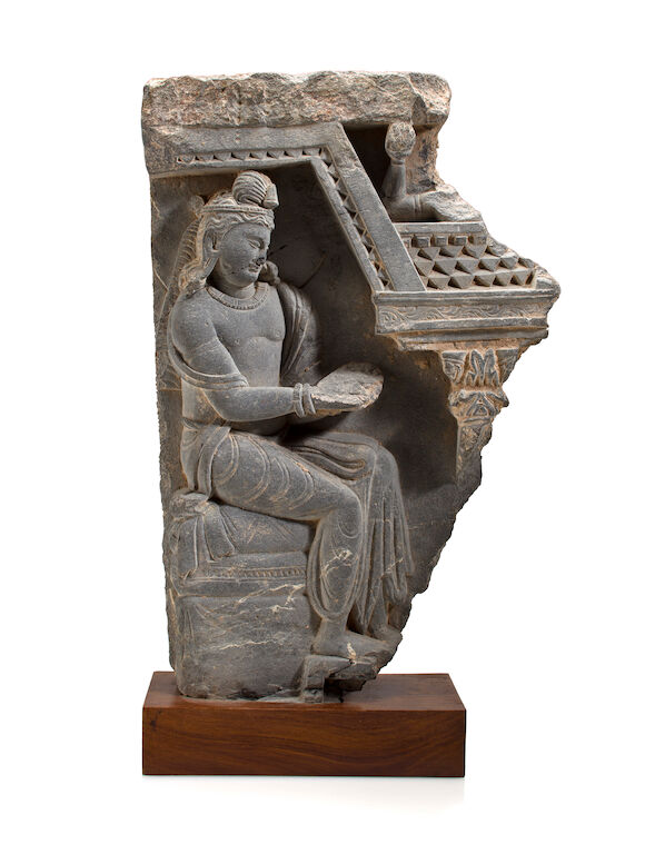 Bonhams : A gray schist relief panel of a bodhisattva, possibly ...