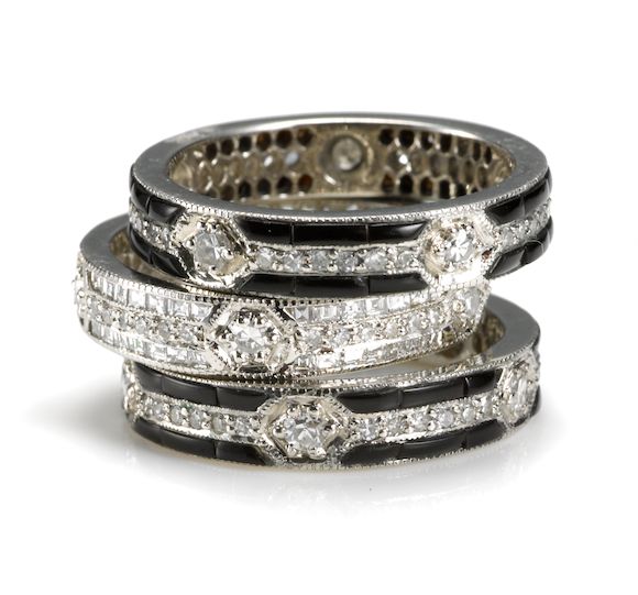 Bonhams A collection of three diamond and black onyx eternity bands