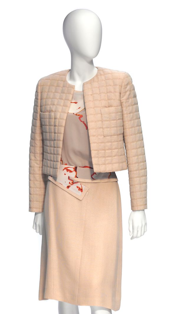 Bonhams : A Chanel tan quilted jacket and tan skirt