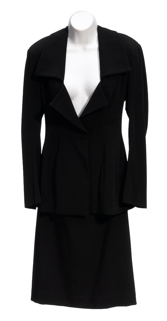 Bonhams : A Yohji Yamamoto black three button jacket and skirt suit