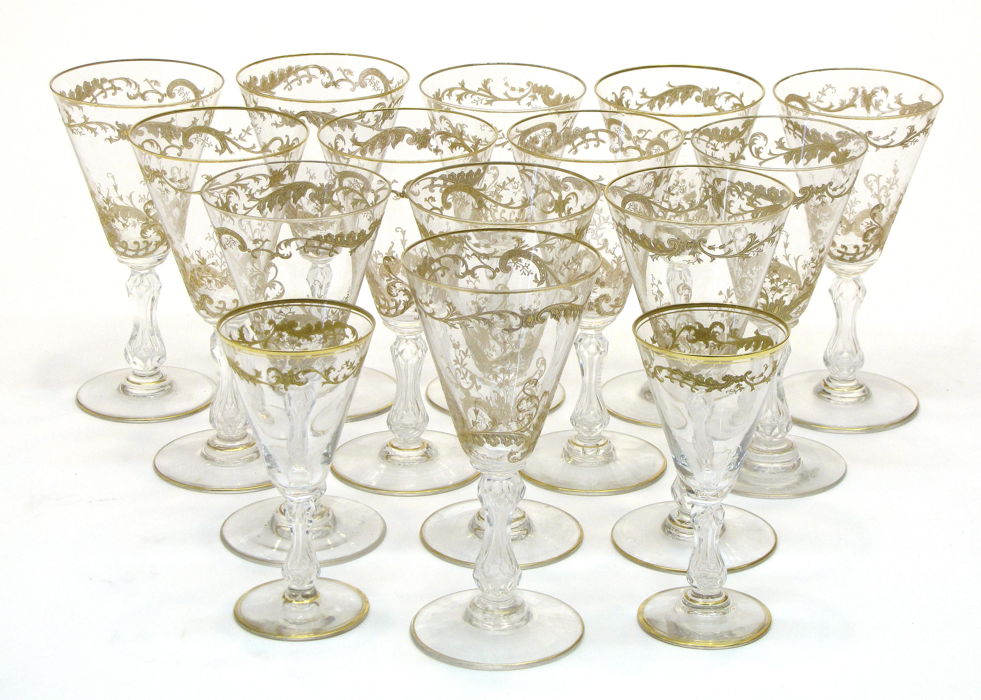 An assembled group of Baccarat, French and Italian gilt and enamel...