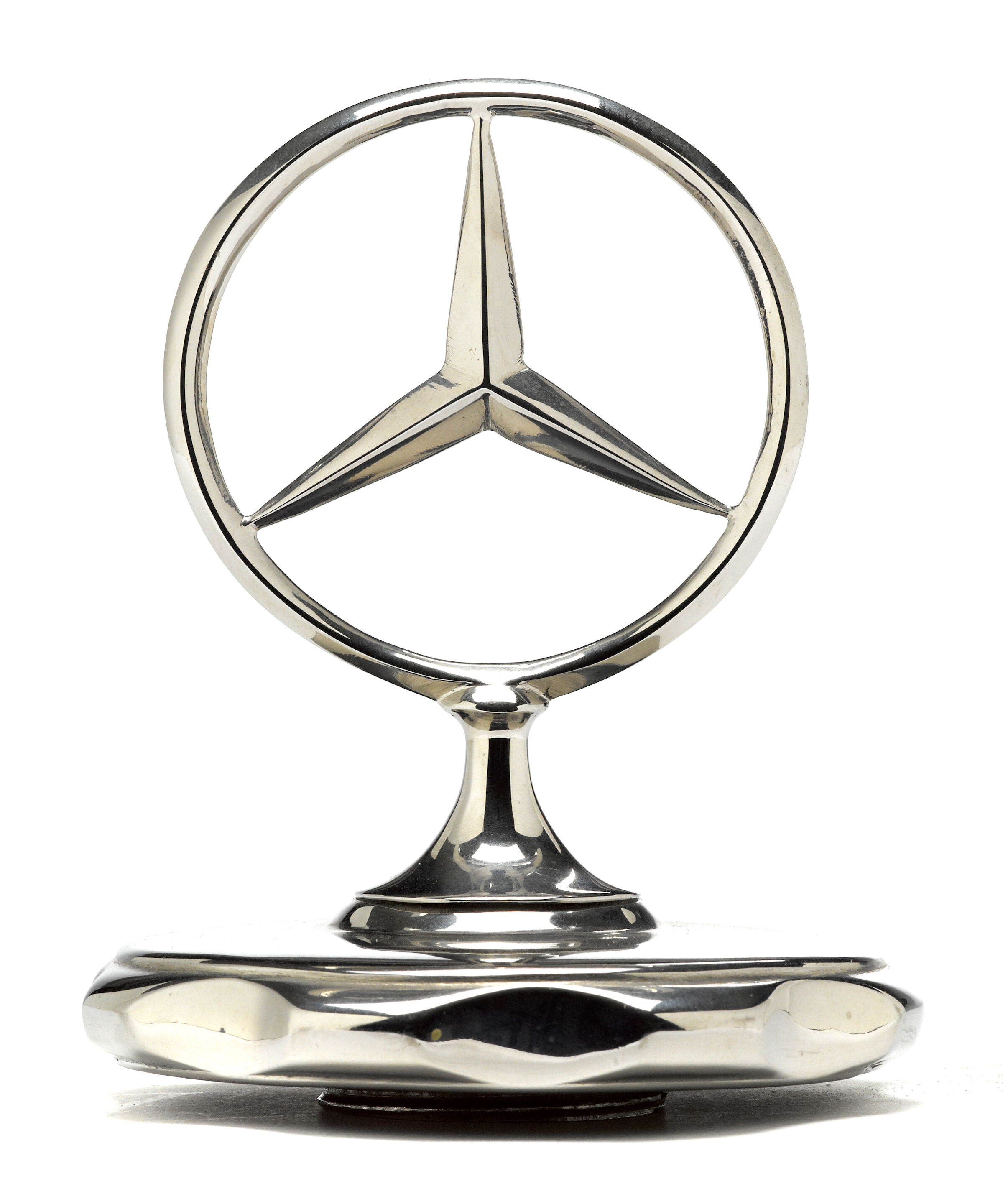 Bonhams Cars : A Mercedes-Benz three pointed star radiator cap,