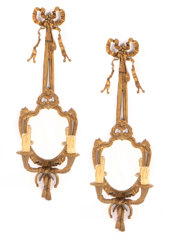 Bonhams : A pair of Louis XVI style bronze two light girandoles