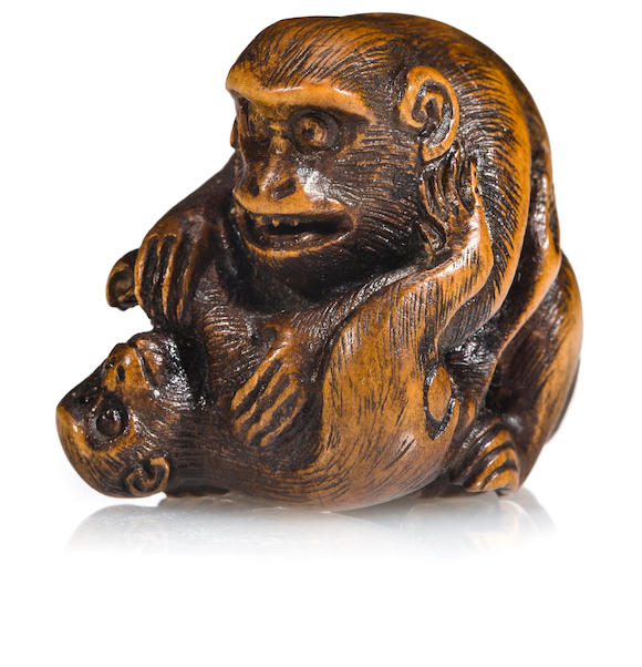 Bonhams : A wood netsuke of monkeys By Ran'ichi, Edo period (19th century)