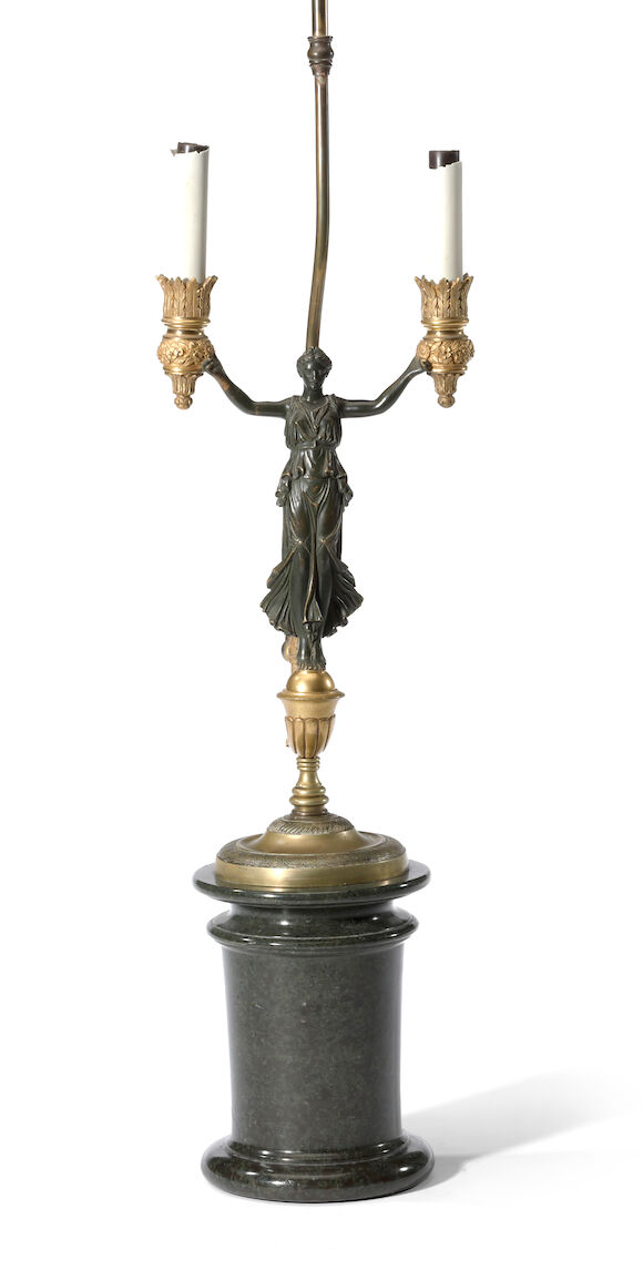 Bonhams : An Empire style patinated and gilt bronze two light figural ...