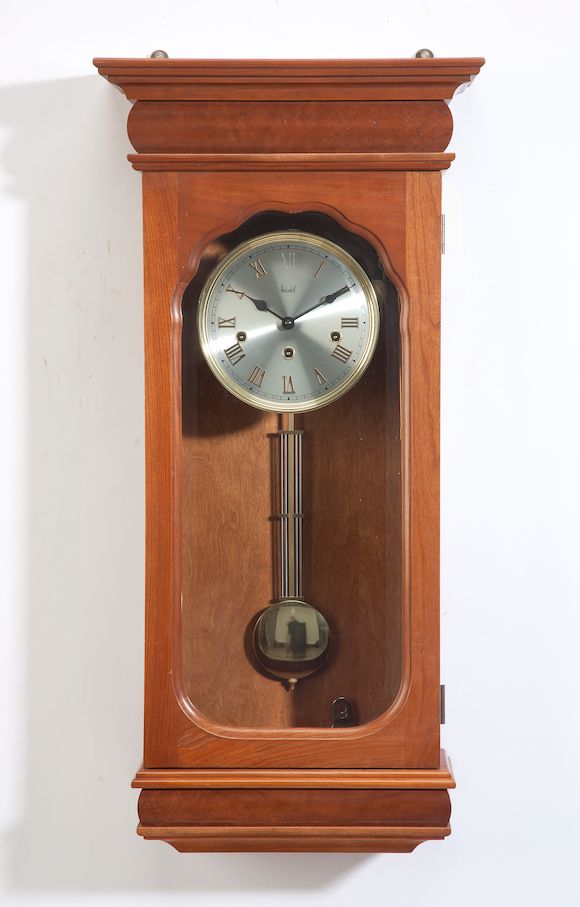 Bonhams A Hentschel cherry and metal wall clock 21st century