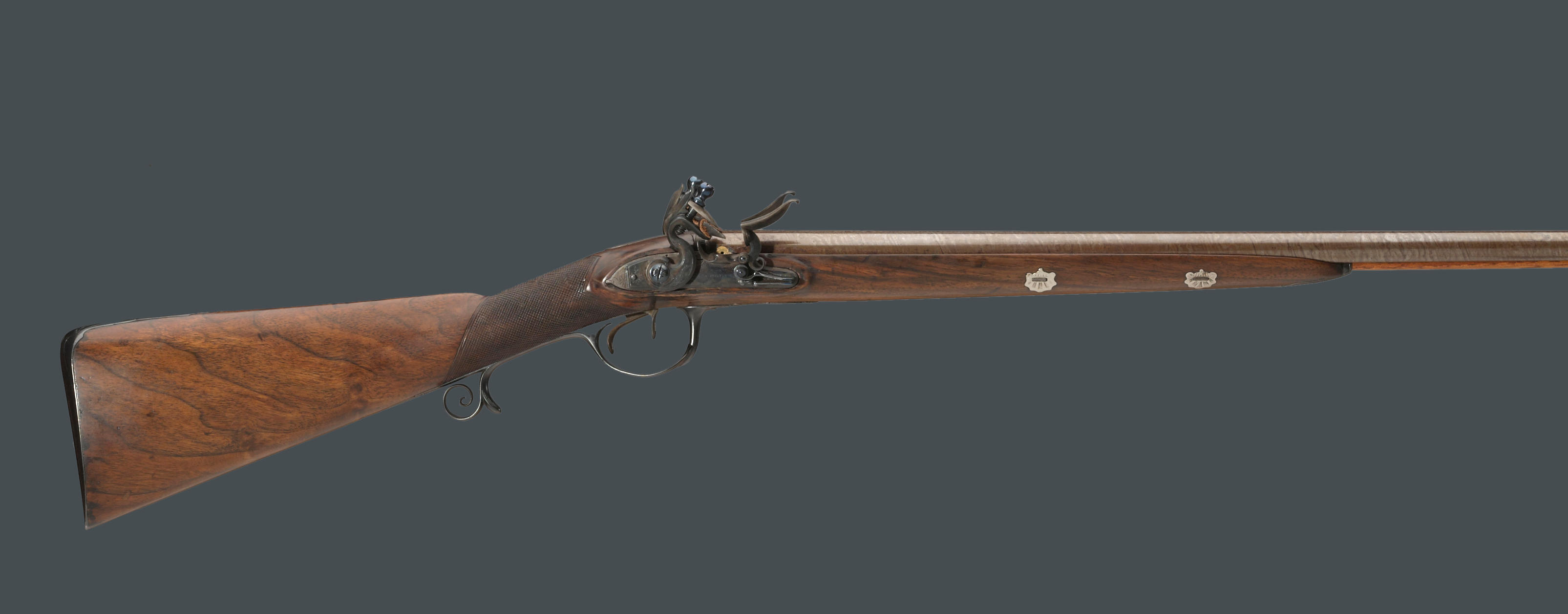 An English double barreled flintlock fowling gun by John Knubley fourth