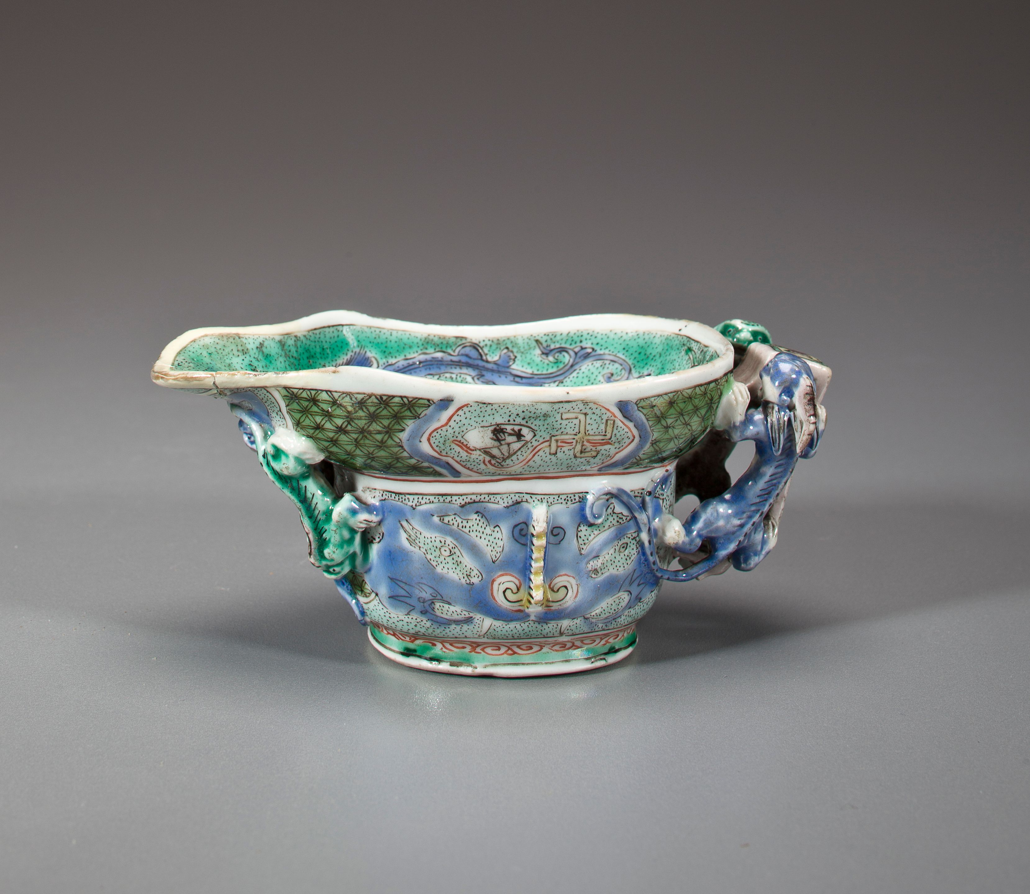 A glazed biscuit libation cup