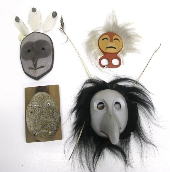 Bonhams Three Eskimo masks and a finger puppet