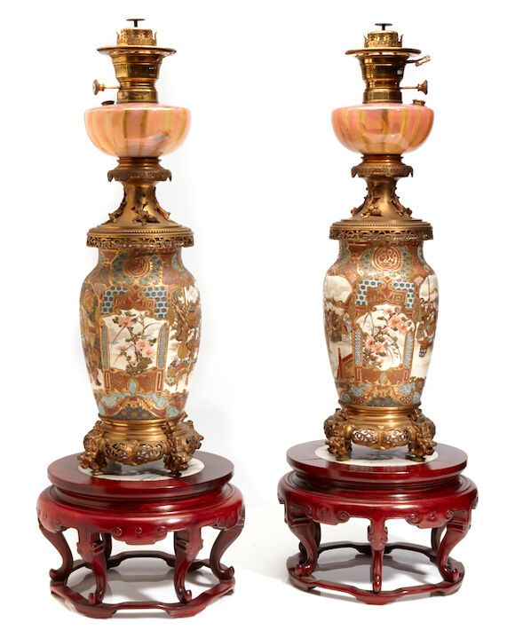 Bonhams : A pair of French gilt bronze mounted oil lamps