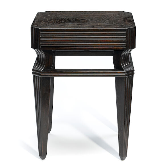 Bonhams A Therien Studios carved stained wood side table