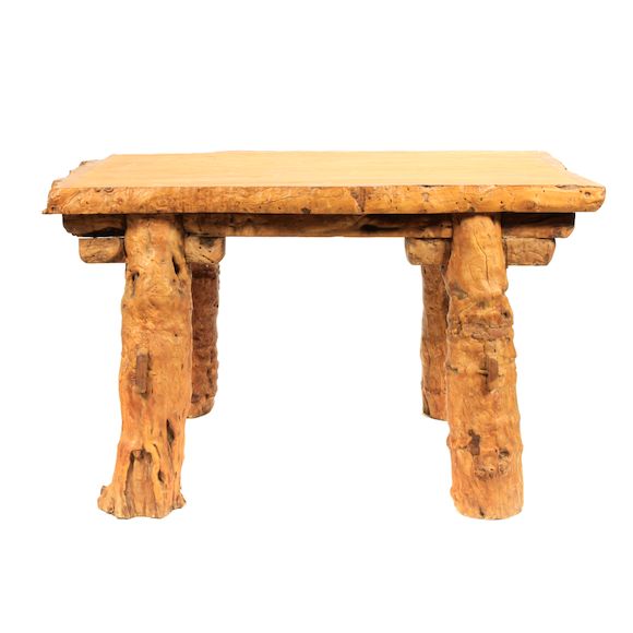 Bonhams A large rustic gnarled wood table