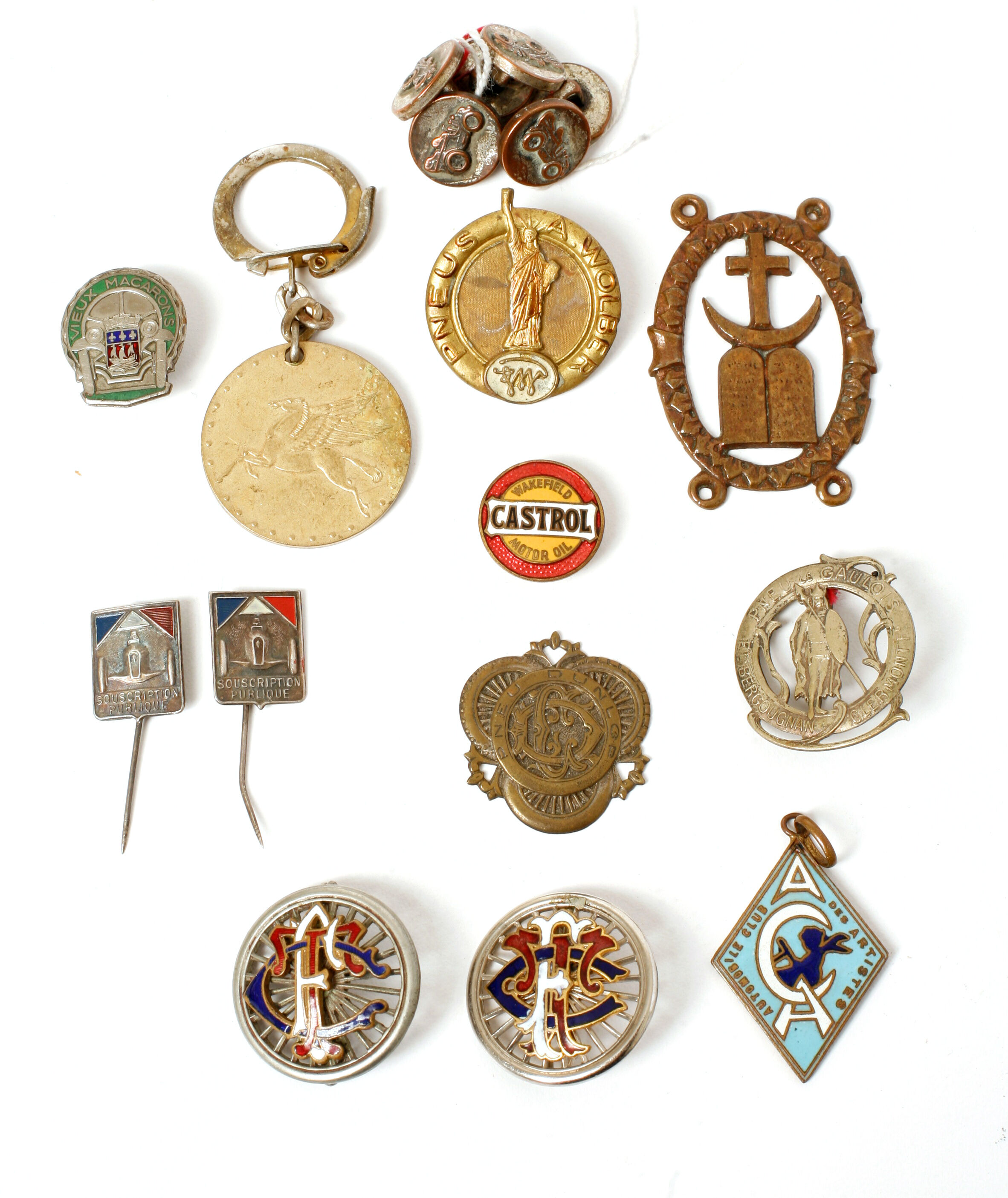 Bonhams Cars : A grouping of automobile pins and medals,