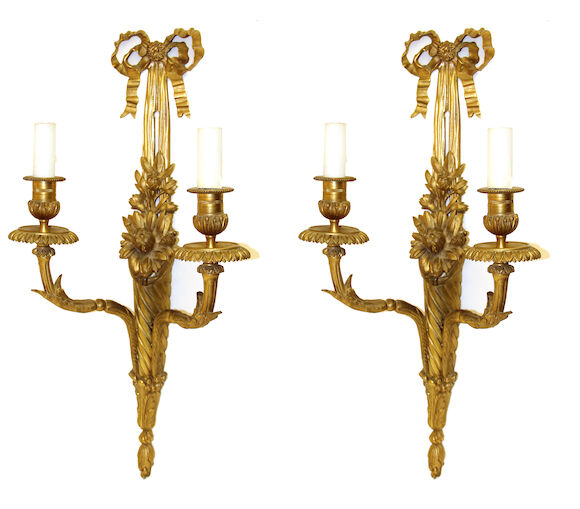 Bonhams : A pair of Louis XVI style gilt bronze two light bras de ...