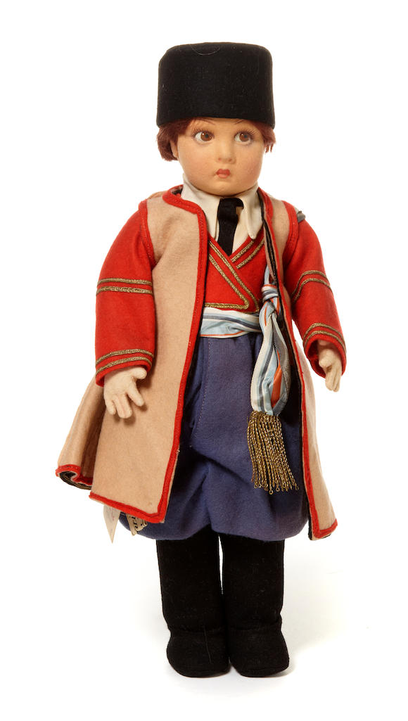 Bonhams : A Lenci felt boy doll in traditional Eastern European costume