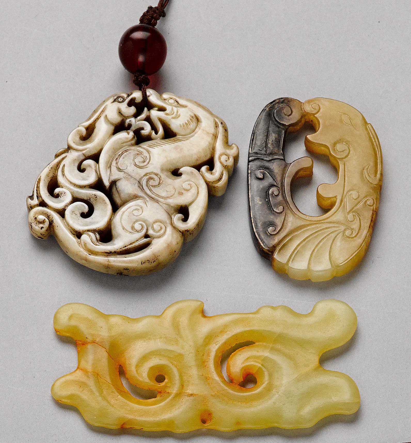 Three jade pendants