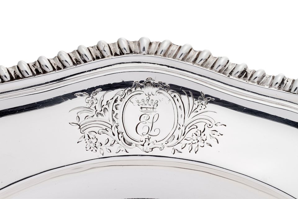 Bonhams A set of eleven Irish II sterling silver dinner plates