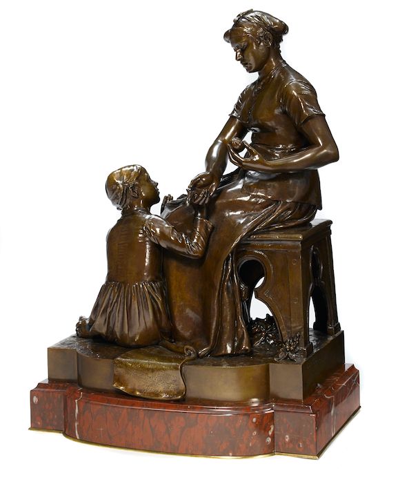 Bonhams A patinated bronze figural group after a model by Lange